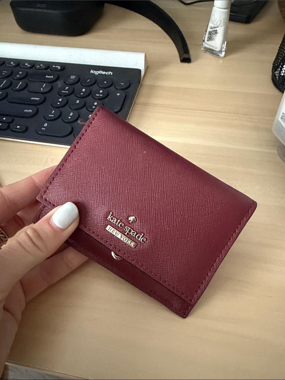 kate spade burgundy leather compact card holder with gold logo